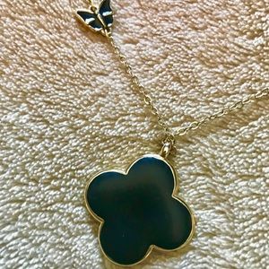 Stunning black or white clover & butterfly pendant